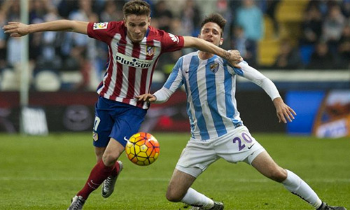 Niguel (trái) đang nổi lên như là một trong những tiền vệ trung tâm trẻ hay nhất ở La Liga. Ảnh: AFP.